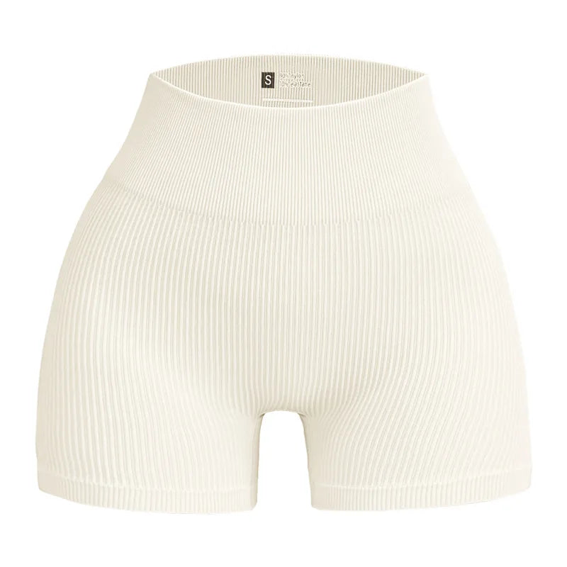 Pantalones cortos de punto acanalados para mujer, shorts de yoga sin costuras, shorts elásticos de cintura alta, shorts sexys para realzar la cadera, pantalones de tres cuartos para ciclismo y running.