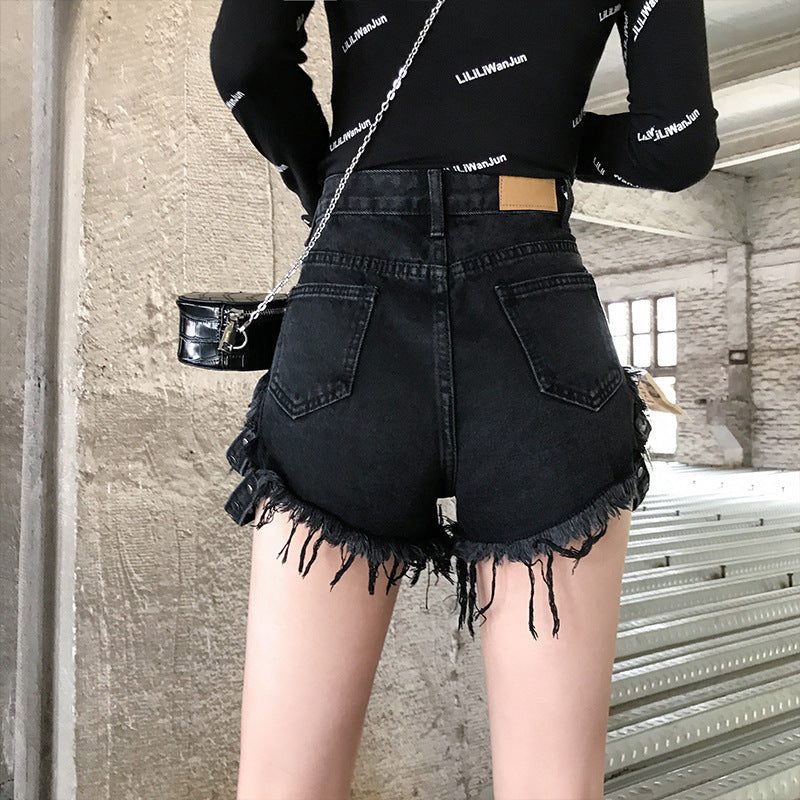 Shorts de mezclilla de talle alto con remaches