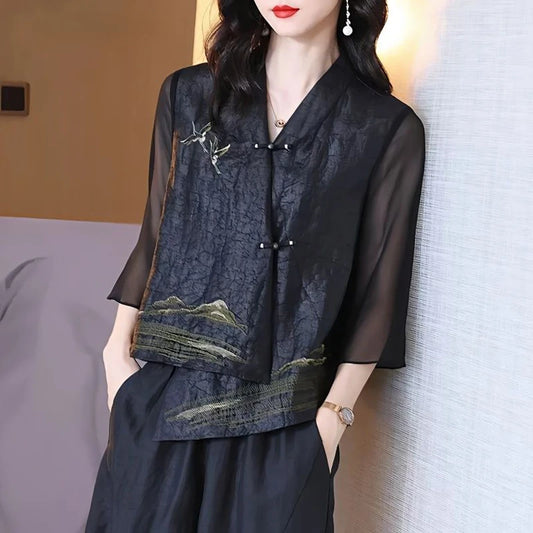 Blusa asimétrica vintage de seda bordada