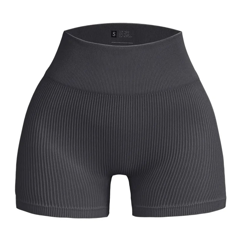 Pantalones cortos de punto acanalados para mujer, shorts de yoga sin costuras, shorts elásticos de cintura alta, shorts sexys para realzar la cadera, pantalones de tres cuartos para ciclismo y running.