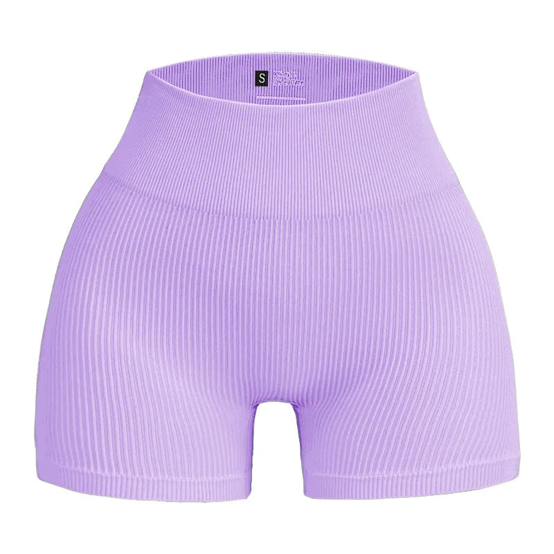 Pantalones cortos de punto acanalados para mujer, shorts de yoga sin costuras, shorts elásticos de cintura alta, shorts sexys para realzar la cadera, pantalones de tres cuartos para ciclismo y running.