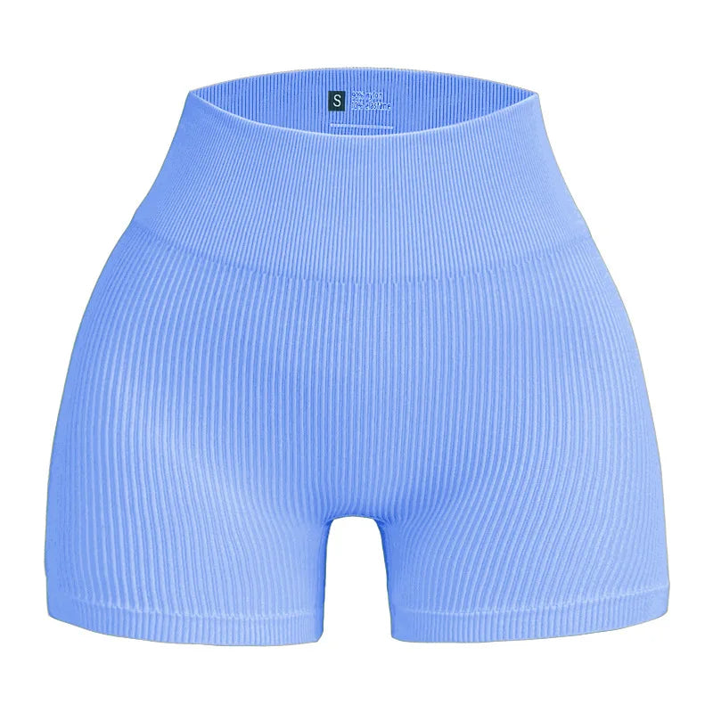Pantalones cortos de punto acanalados para mujer, shorts de yoga sin costuras, shorts elásticos de cintura alta, shorts sexys para realzar la cadera, pantalones de tres cuartos para ciclismo y running.