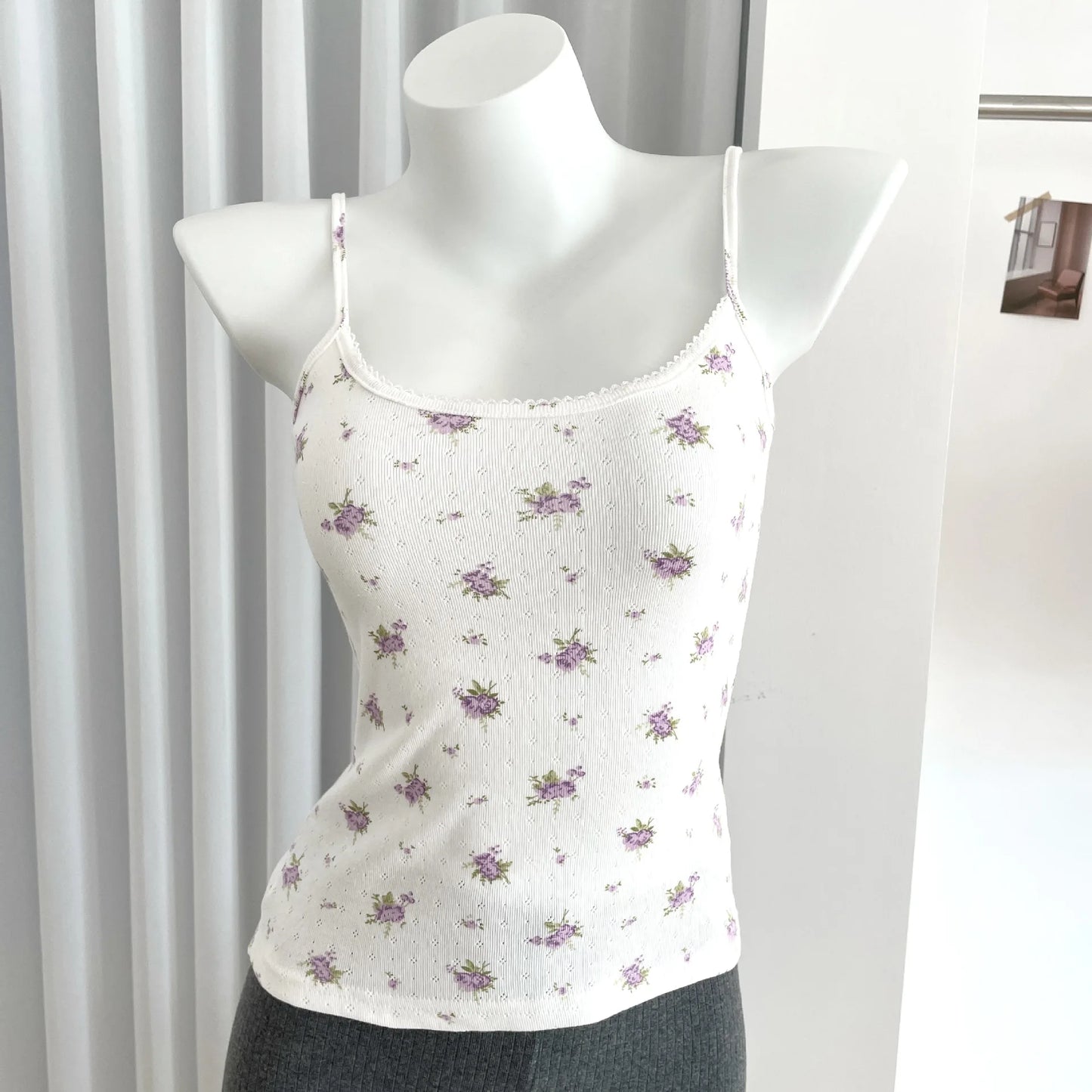 Top corto Floral con ojetes y lazo