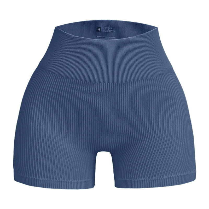 Pantalones cortos de punto acanalados para mujer, shorts de yoga sin costuras, shorts elásticos de cintura alta, shorts sexys para realzar la cadera, pantalones de tres cuartos para ciclismo y running.