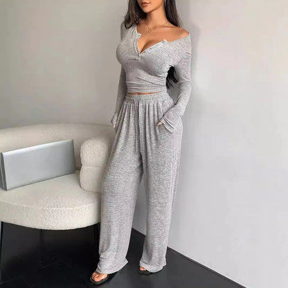 Traje informal de dos piezas para mujer: top de manga larga con botones de color liso y pantalones de pierna ancha con bolsillos y cordón, para primavera/verano.