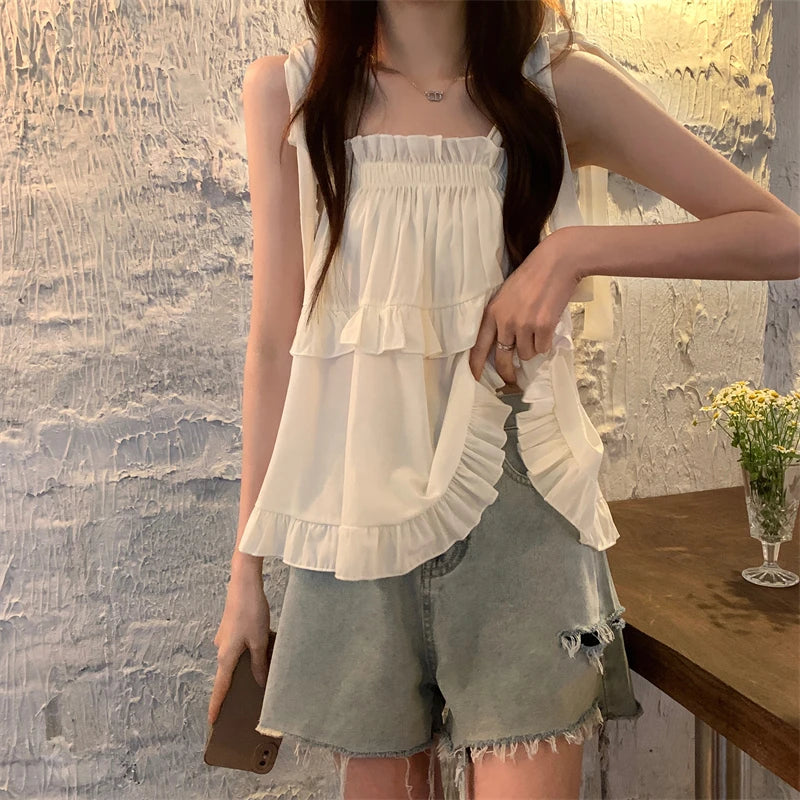 Camiseta sin mangas con tirantes y volantes