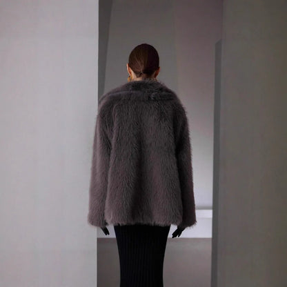 2025 Otoño Invierno Nueva Moda Chaqueta de Mujer de Pelo Sintético de Color Liso con Cuello Vuelto Manga Larga Sencilla Básica Elegante Abrigo Femenino