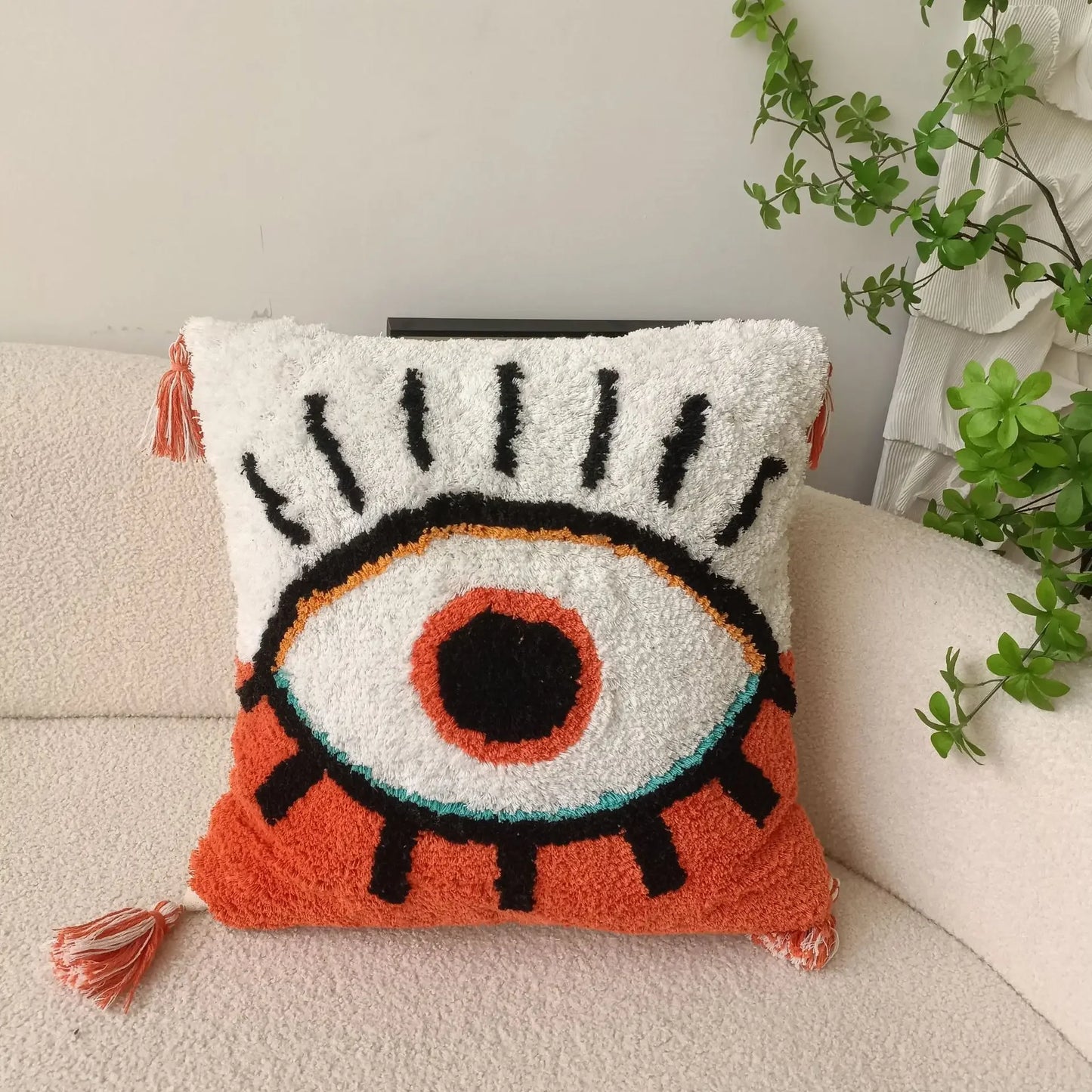 Funda de cojín bordada con ojo