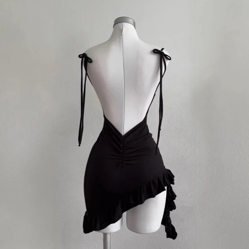 Minivestido sexy sin mangas y sin espalda para mujer 2025 Vestidos ceñidos con cordones de Europa y América para verano Vestido negro de fiesta y club de calle
