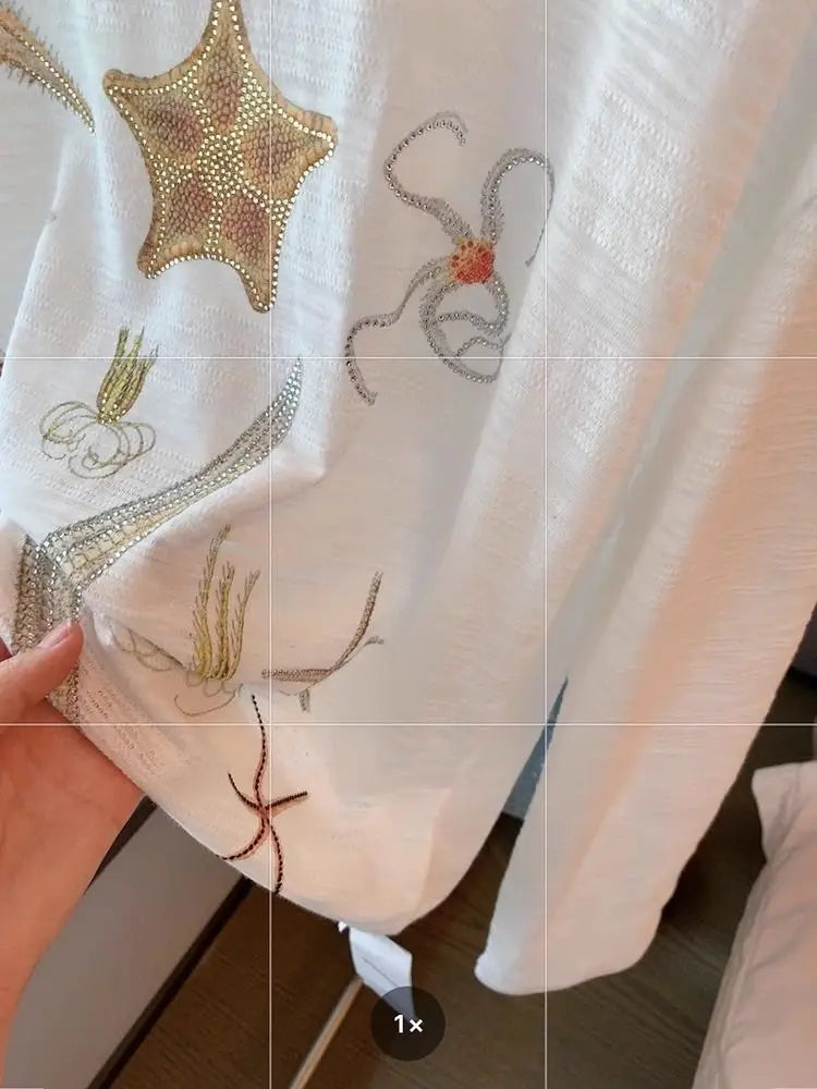 Camiseta de manga larga con estrellas de mar