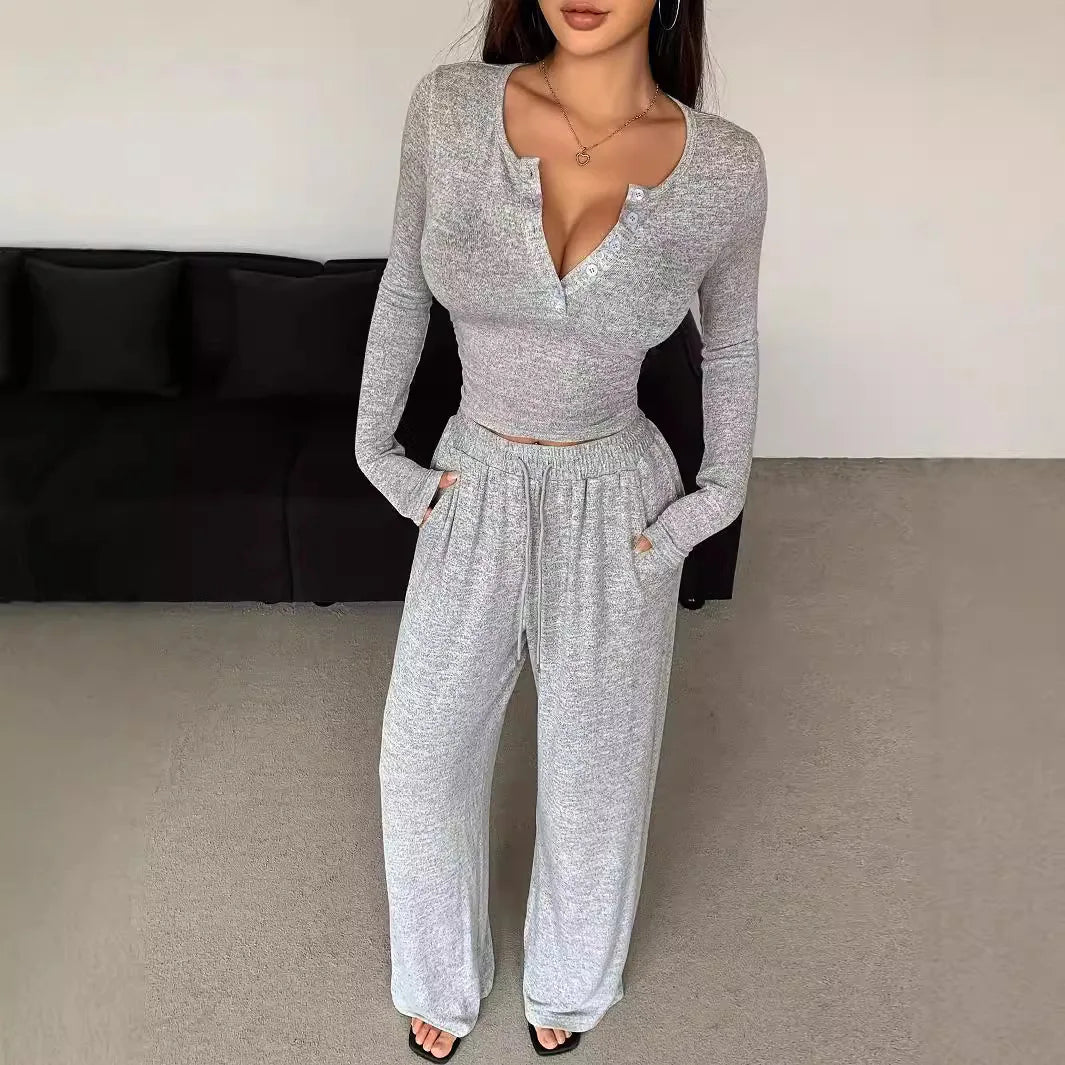 Traje informal de dos piezas para mujer: top de manga larga con botones de color liso y pantalones de pierna ancha con bolsillos y cordón, para primavera/verano.