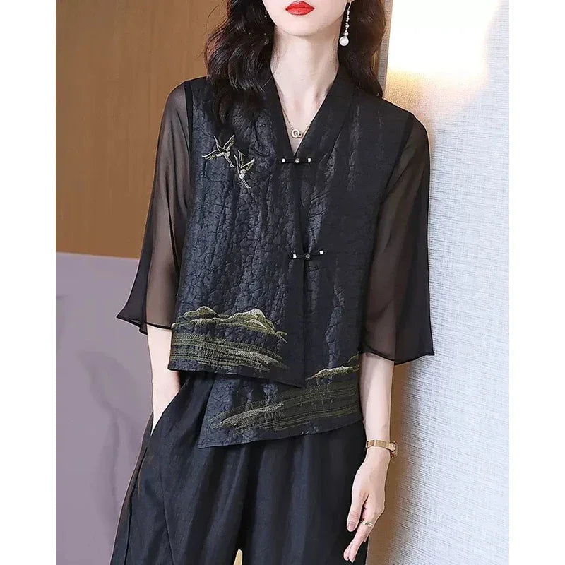 Blusa asimétrica vintage de seda bordada
