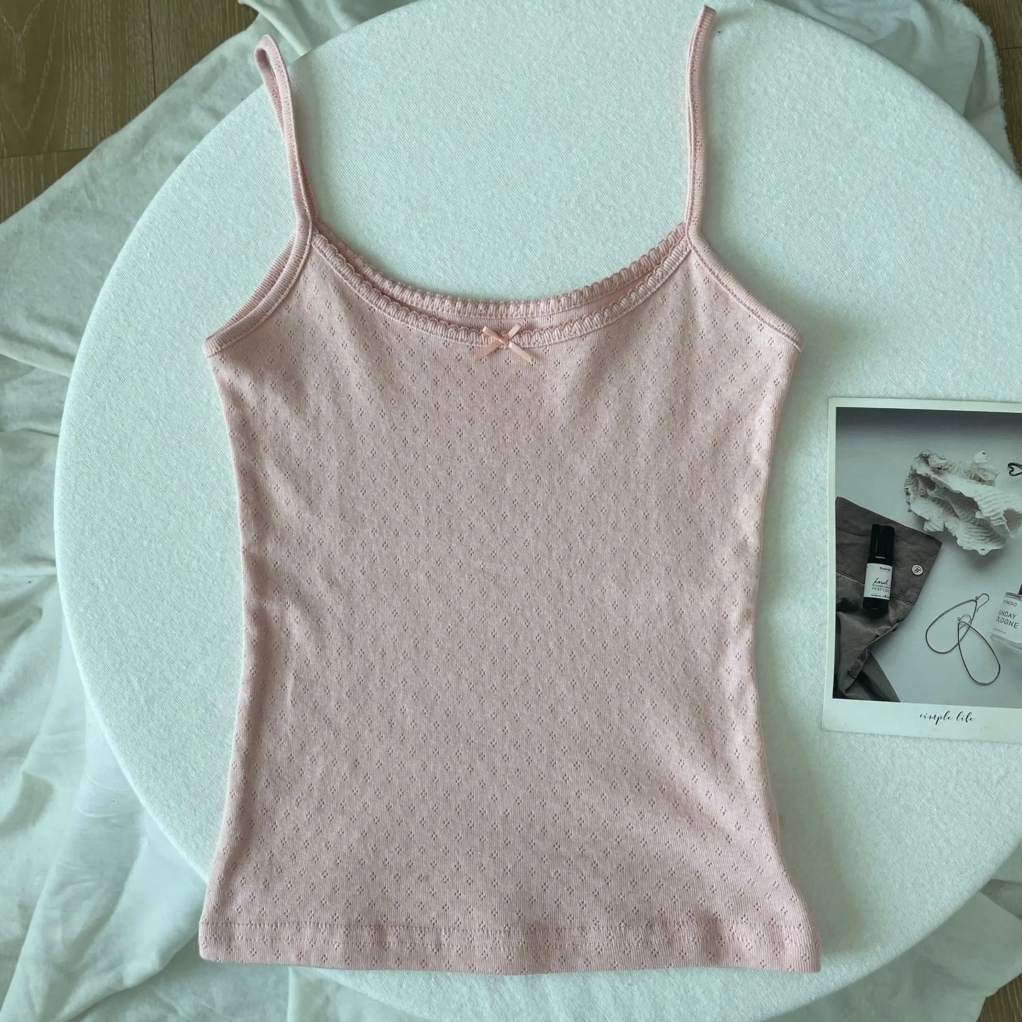 Top corto Floral con ojetes y lazo