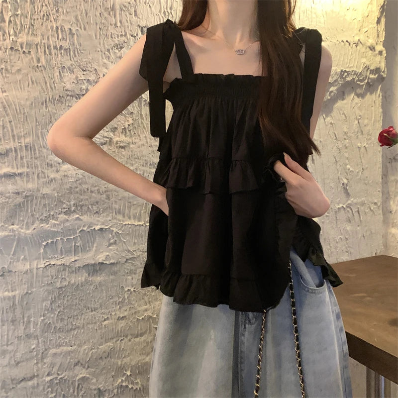 Camiseta sin mangas con tirantes y volantes