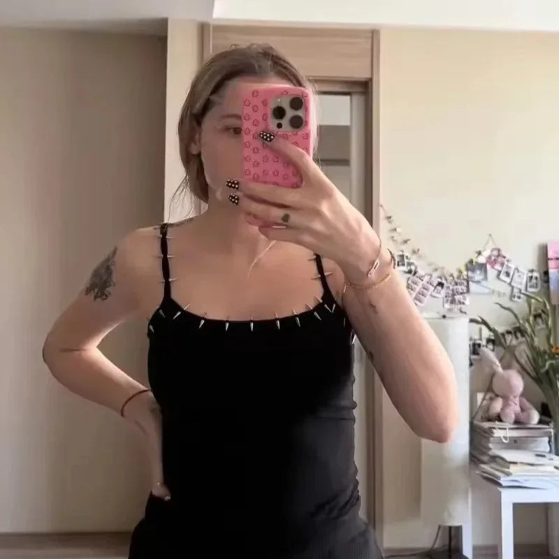 Tanque con cuello de púas