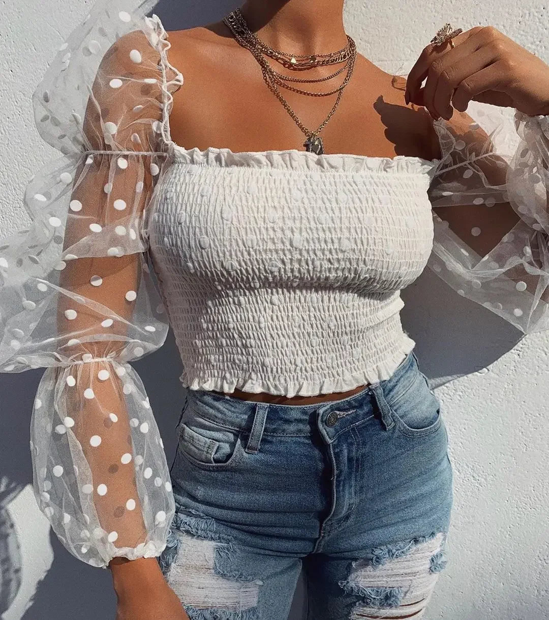 Blusa de malla transparente