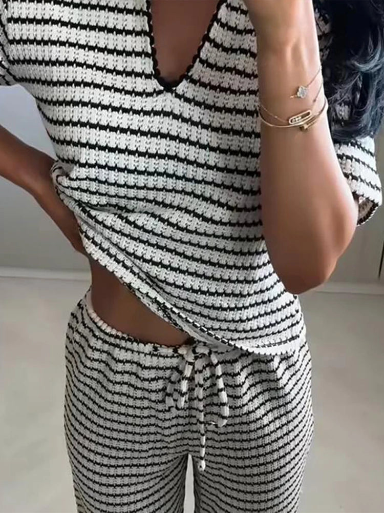 Conjunto de dos piezas elegante de punto a rayas para mujer, top y pantalón, informal, manga corta, cuello V, jersey con cordón ajustable, pantalón largo de pierna ancha, traje de moda 2025