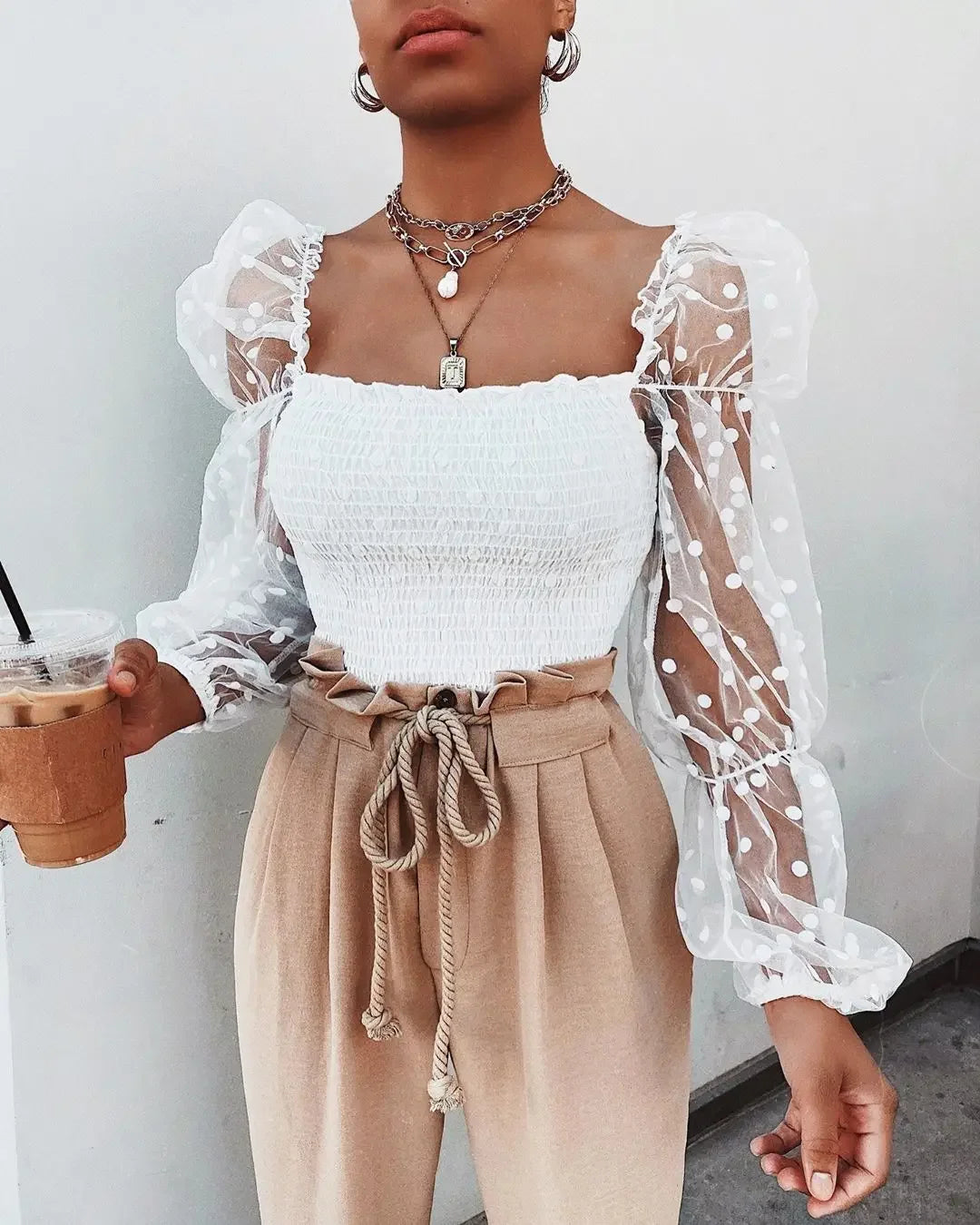 Blusa de malla transparente