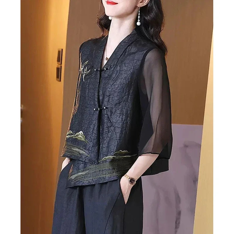 Blusa asimétrica vintage de seda bordada