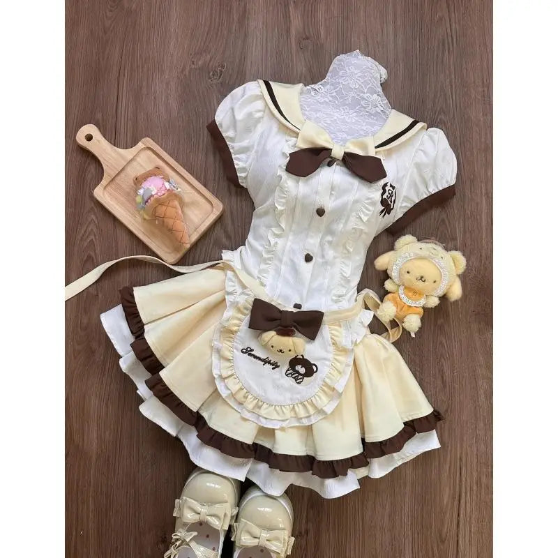 Top con lazo + Falda plisada de encaje