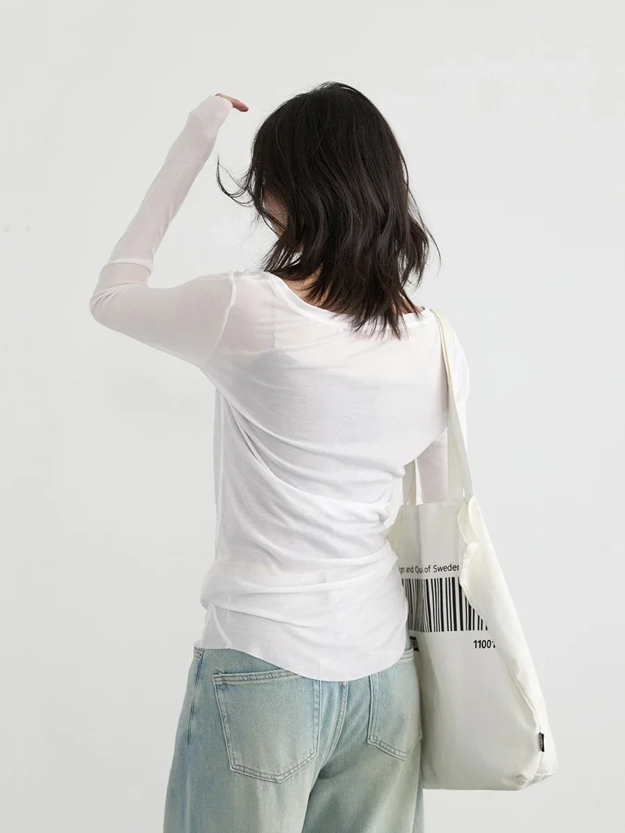 Camiseta de manga larga blanca sólida con cuello en U