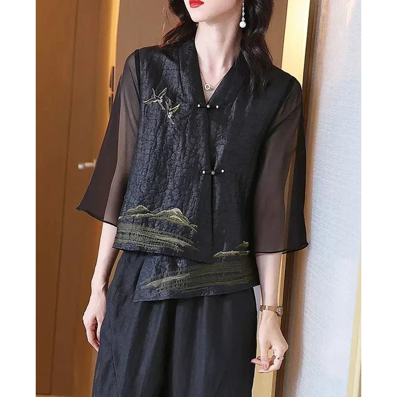 Blusa asimétrica vintage de seda bordada