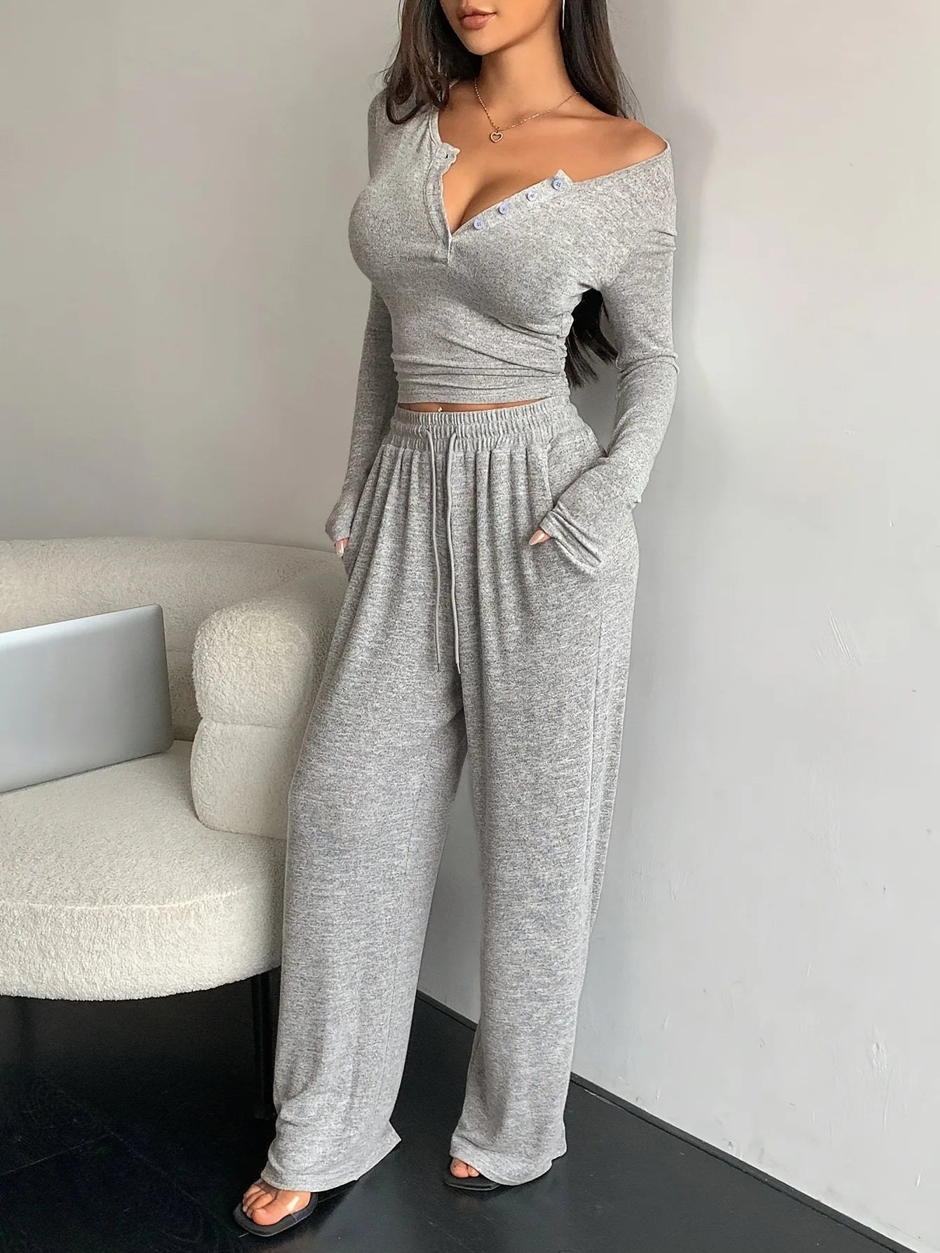 Traje informal de dos piezas para mujer: top de manga larga con botones de color liso y pantalones de pierna ancha con bolsillos y cordón, para primavera/verano.