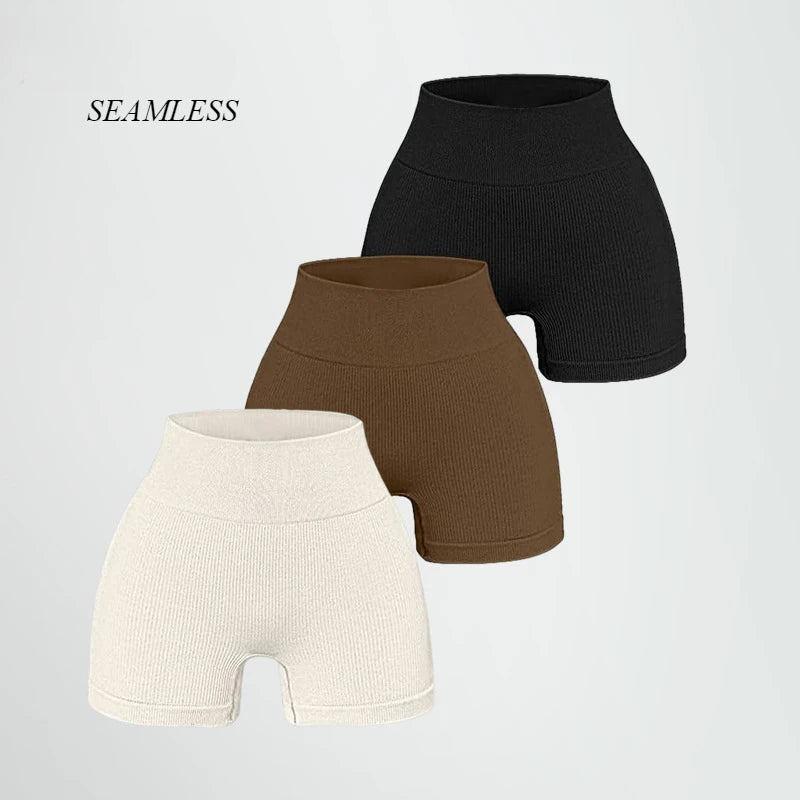 Pantalones cortos de punto acanalados para mujer, shorts de yoga sin costuras, shorts elásticos de cintura alta, shorts sexys para realzar la cadera, pantalones de tres cuartos para ciclismo y running.