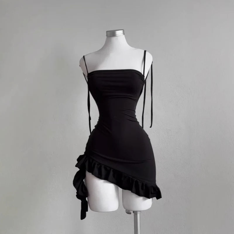 Minivestido sexy sin mangas y sin espalda para mujer 2025 Vestidos ceñidos con cordones de Europa y América para verano Vestido negro de fiesta y club de calle