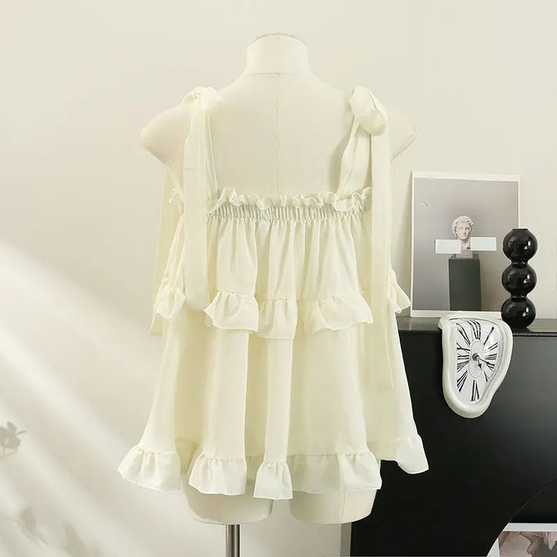 Camiseta sin mangas con tirantes y volantes