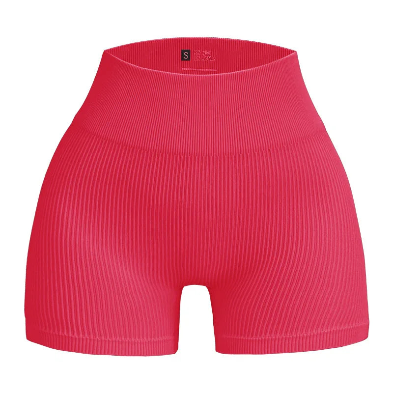 Pantalones cortos de punto acanalados para mujer, shorts de yoga sin costuras, shorts elásticos de cintura alta, shorts sexys para realzar la cadera, pantalones de tres cuartos para ciclismo y running.