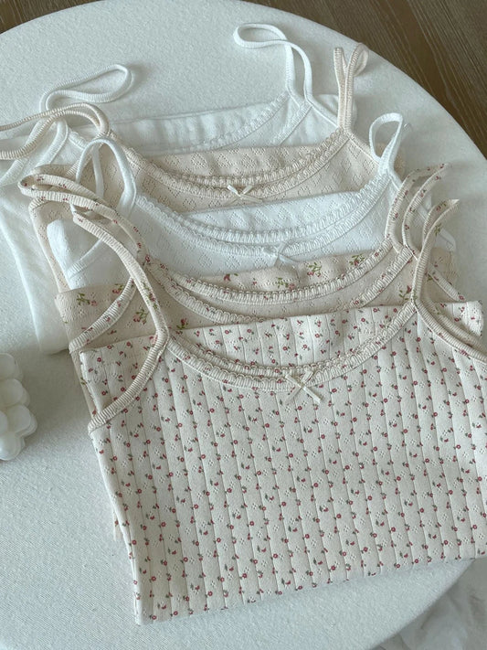 Top corto Floral con ojetes y lazo