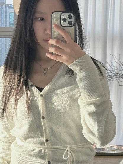 Slouchy V-neck Split hem Strappy design Knit top